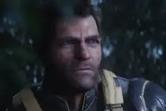 Wolverine with no mask on looks thoughtfully into the distance