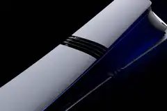 An abstract angled shot of the PS5 Pro against a black background