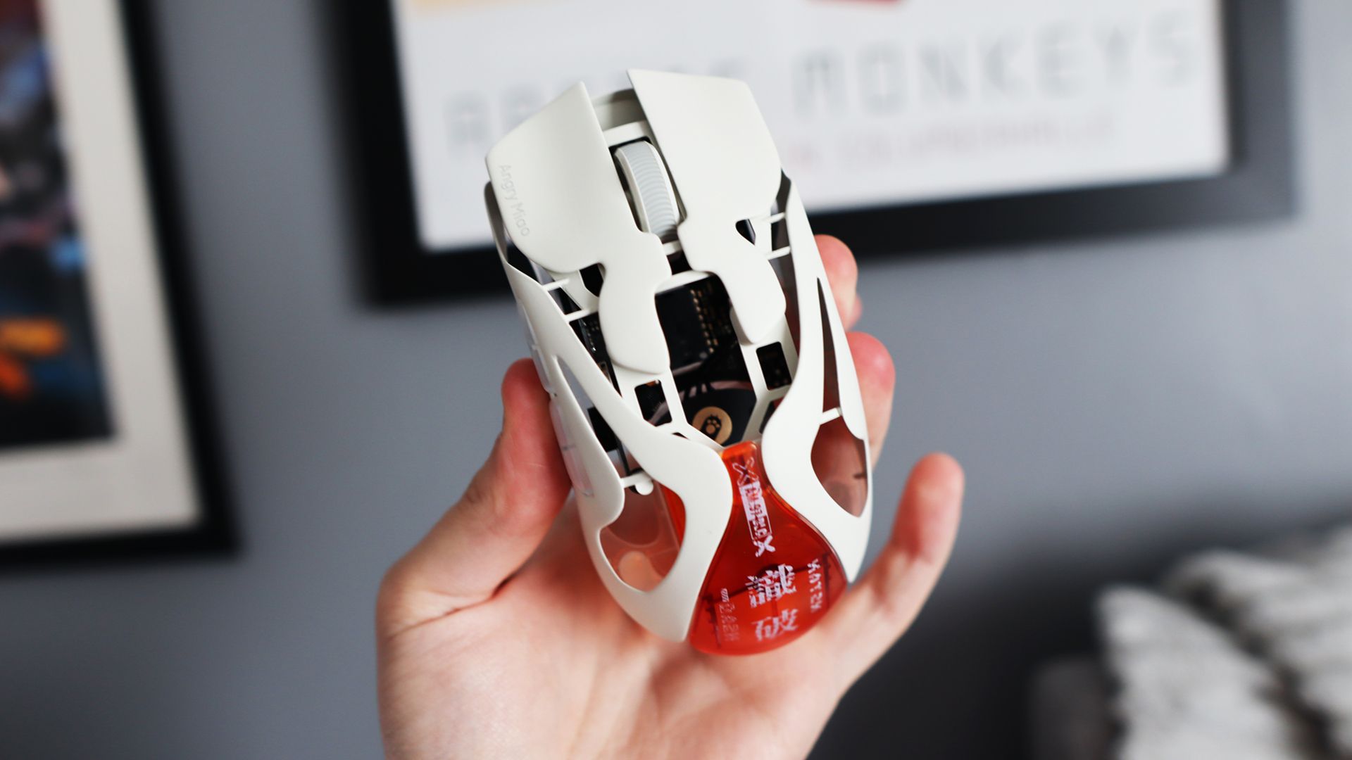 The AngryMiao AM Infinity.97 gaming mouse in hand for testing.