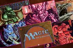 Graphic featuring five dragons from the collectible card game Magic: The Gathering