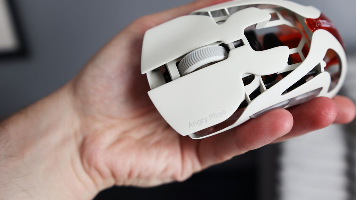 The AngryMiao AM Infinity.97 gaming mouse in hand for testing.