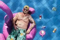Cal Hampton floats in a pool in Grand Theft Auto 6.