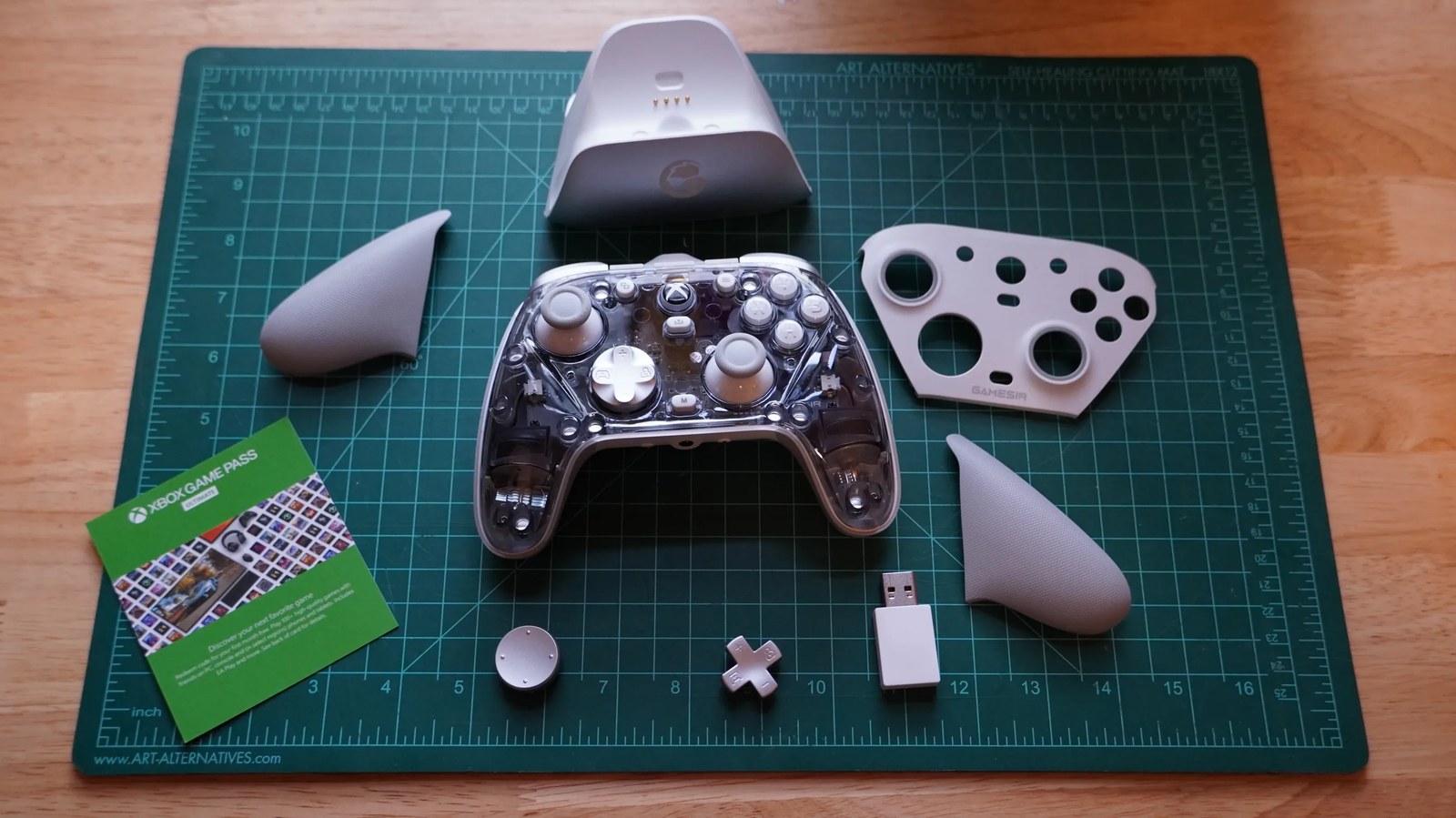 The GameSir G7 Pro with its face shield removed, showing a clear shell interior.