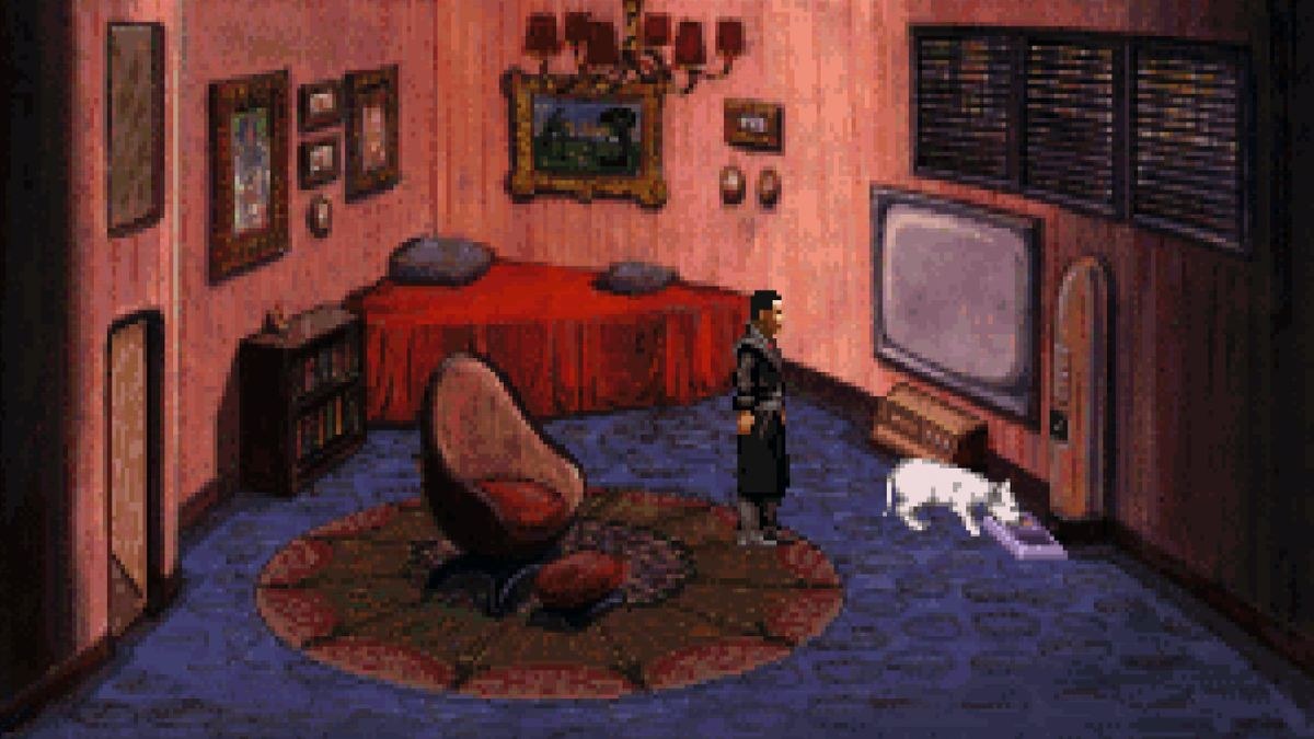 A character in a black coat stands in a room next to a cat and a television.