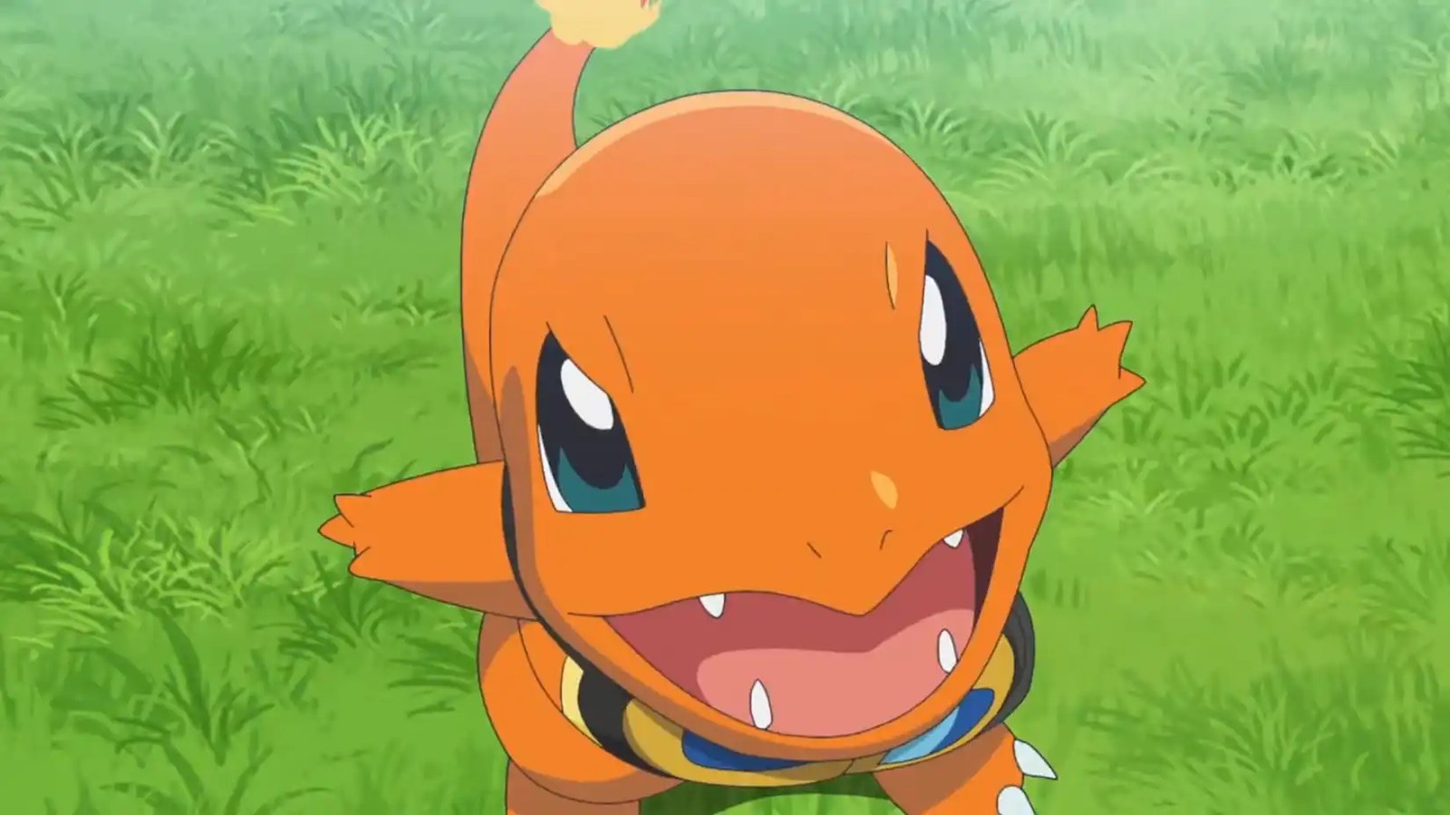 A Charmander with goggles trying to be intimidating but being cute instead.