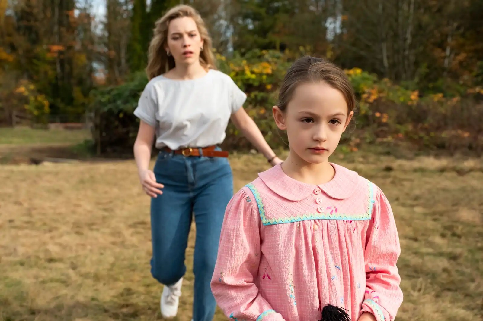 Dani and Flora walk up to the lake in Haunting of Bly Manor