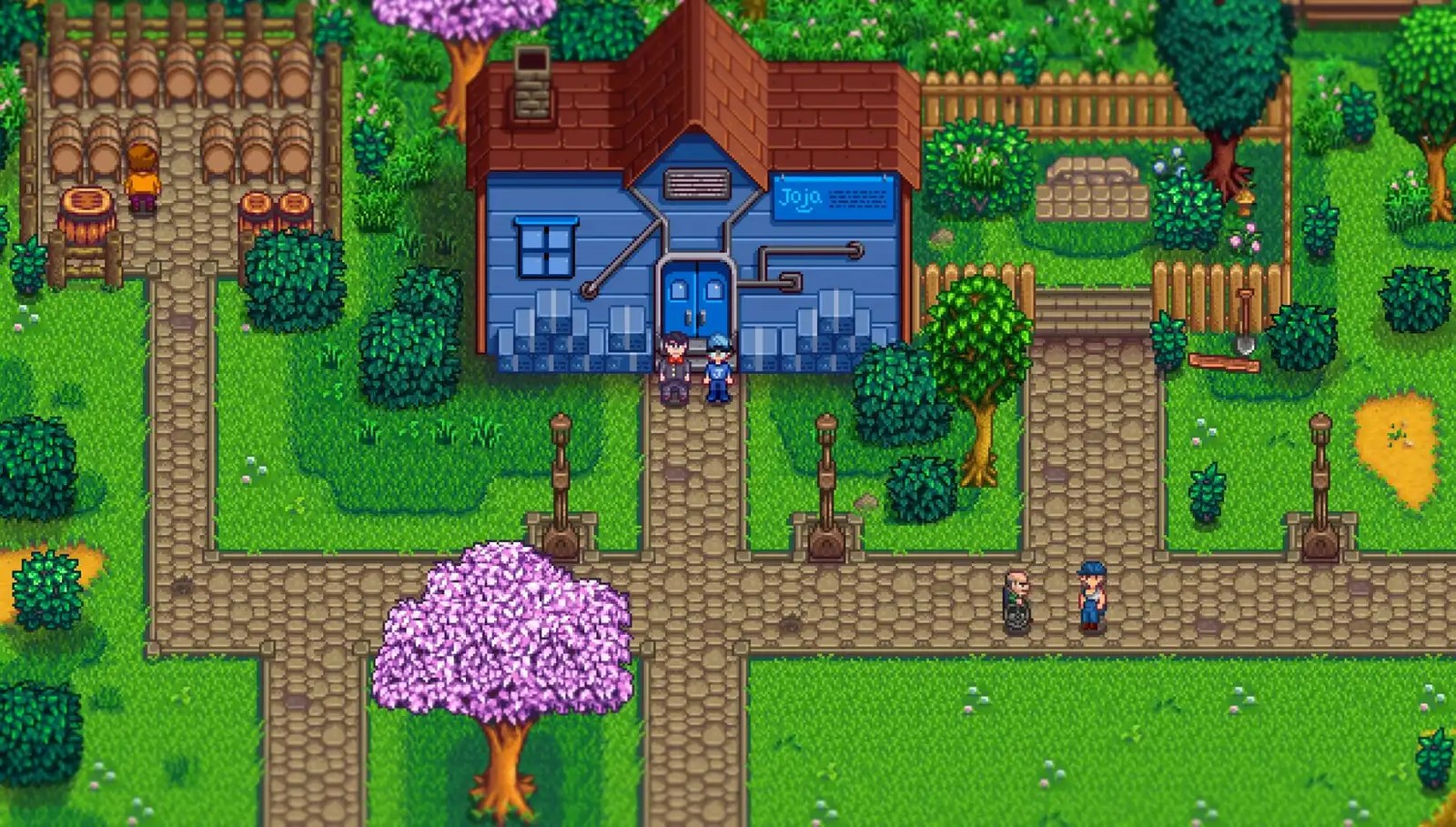 An image of the Stardew Valley Expanded mod that shows a character standing in front of a Joja Mart store using the base game of Stardew Valley.