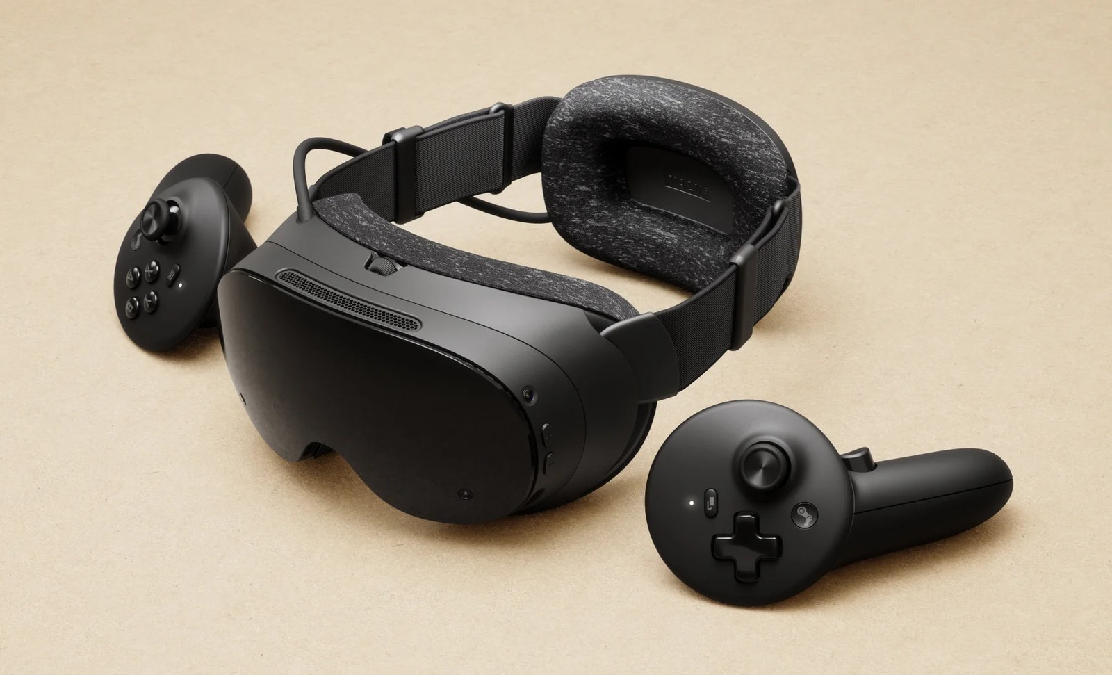 The Steam Frame sitting between the two controllers.