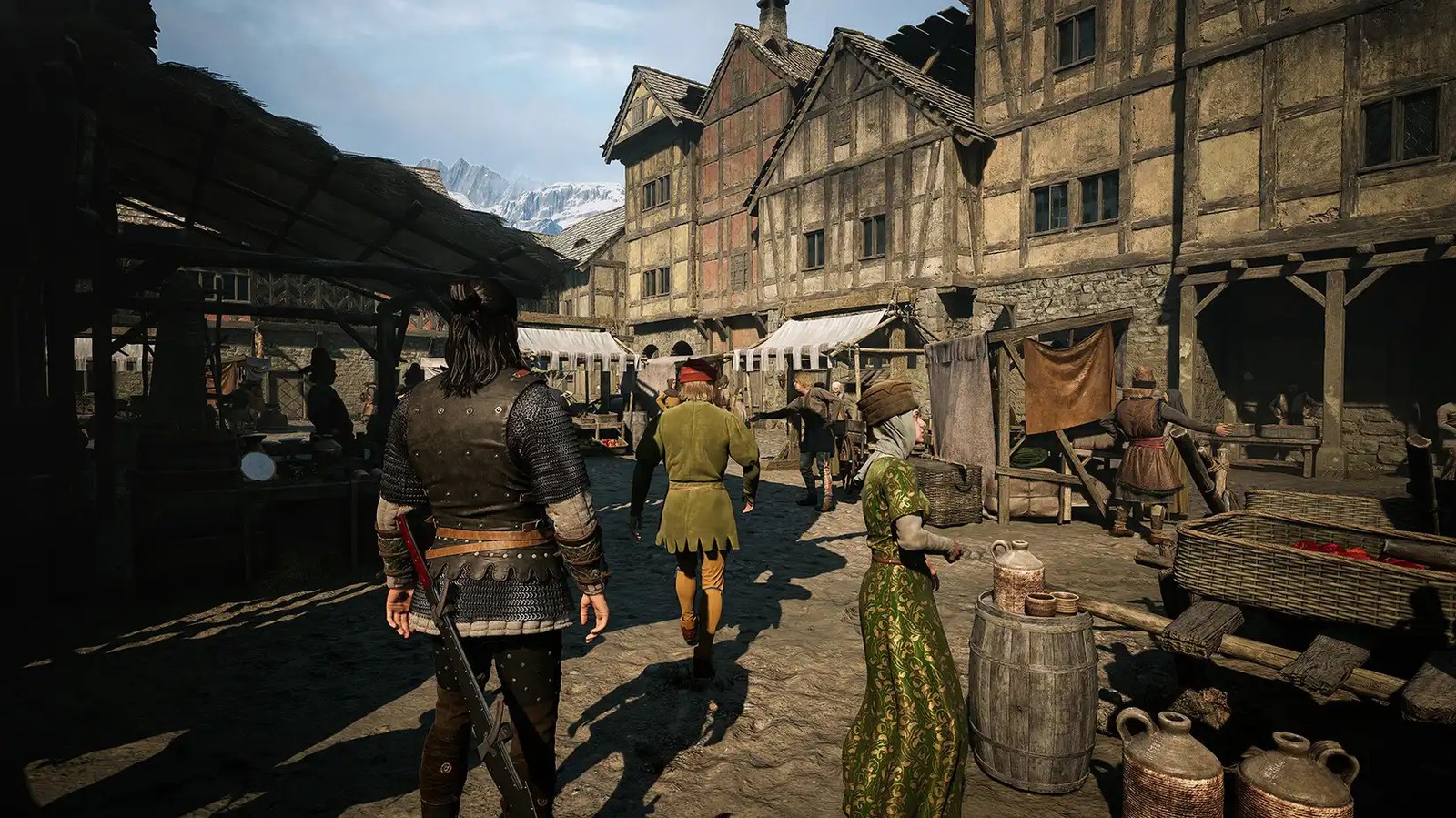 Coen stands in a medieval town
