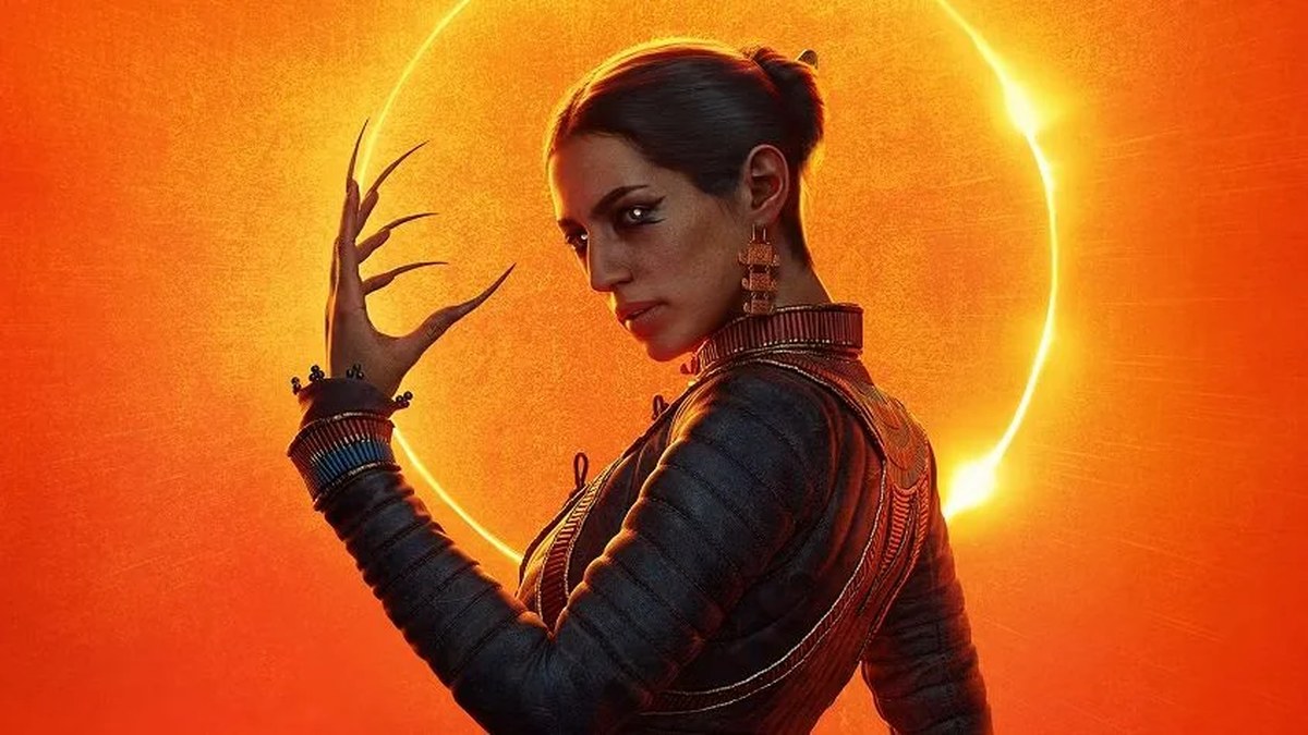 A female vampire with sharp claws silhouetted against a glowing orange eclipse.