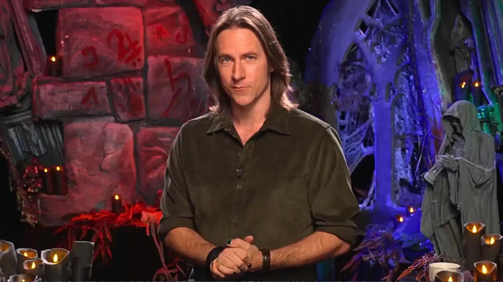 critical role matthew mercer surrounded by gothic and creepy figures