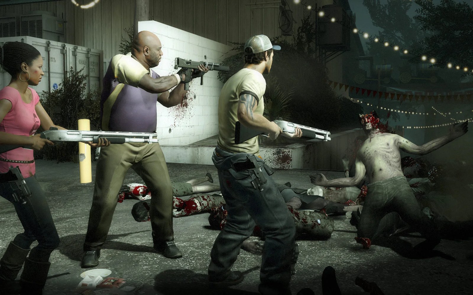 Three survivors fight off a horde of zombies, with one zombie in the foreground appearing to have been shot in the head, amidst a scene of carnage.