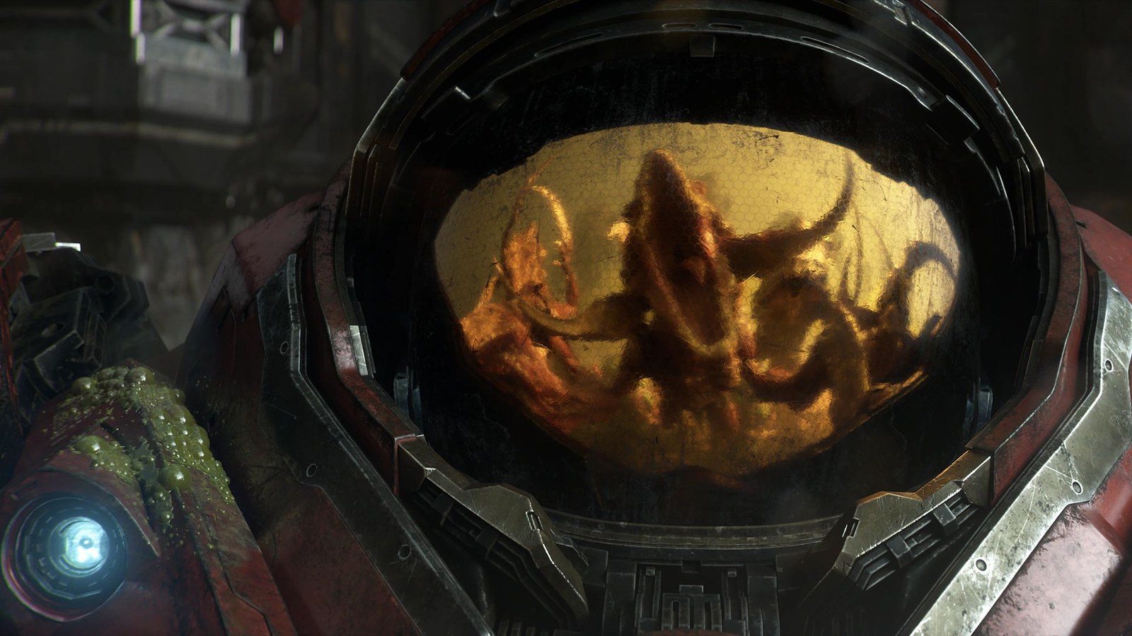 A space marine's closed helmet reflects the oncoming zerg