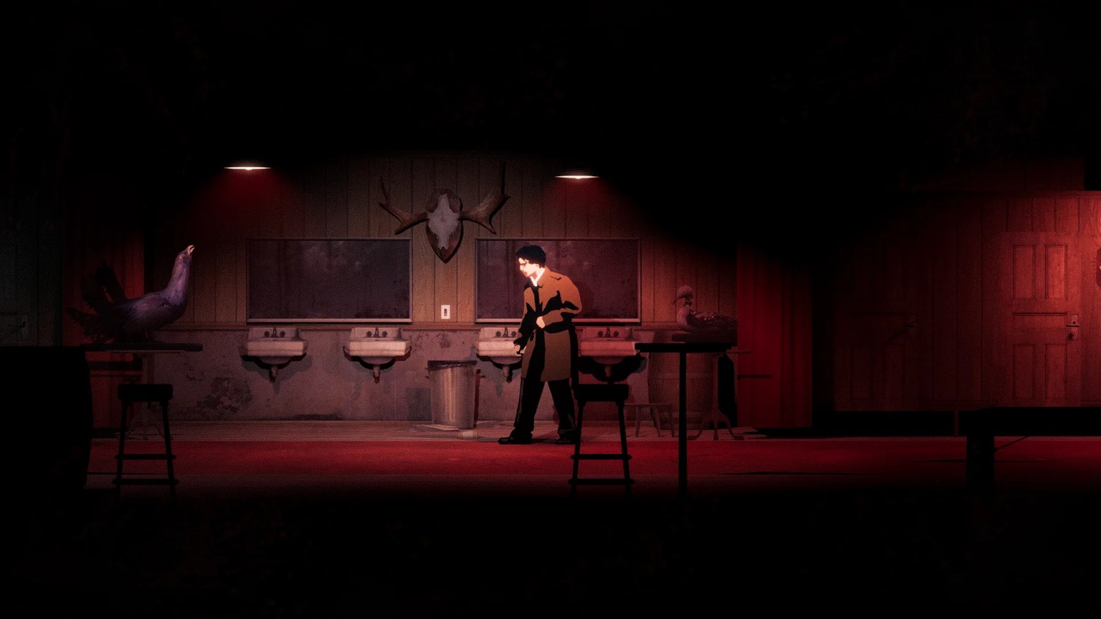 A moody, red-lit bar bathroom in Silver Pines.
