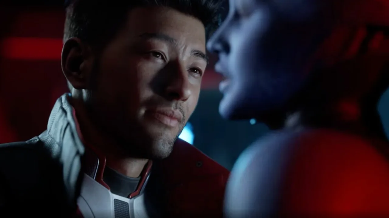 Mass Effect: Universe's male protagonist flirts with an Asari (off-screen) in a dimly lit bar.
