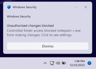A notification showing Microsoft Defender has blocked access to a protected folder